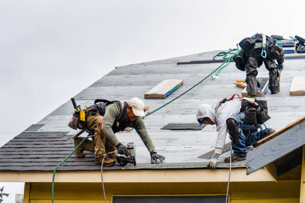 Professional Gutter Installation technician working in Loogootee, IN